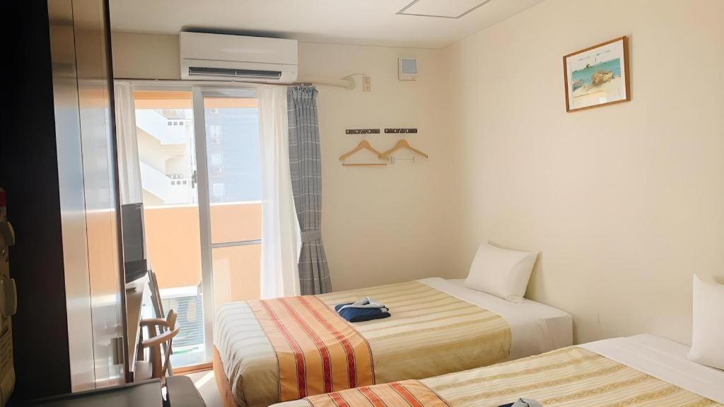 נאהא Hotel Peace Land Kume מראה חיצוני תמונה