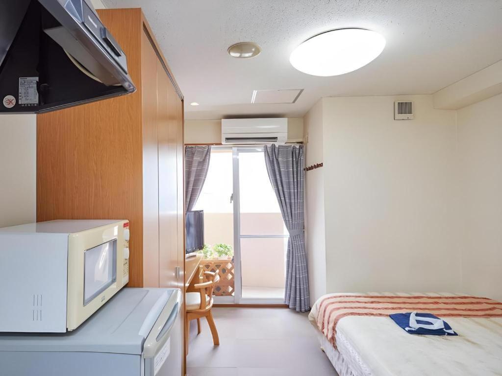 נאהא Hotel Peace Land Kume מראה חיצוני תמונה