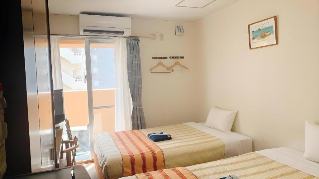 נאהא Hotel Peace Land Kume מראה חיצוני תמונה