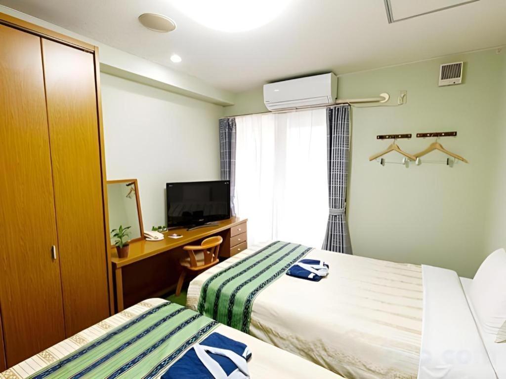 נאהא Hotel Peace Land Kume מראה חיצוני תמונה