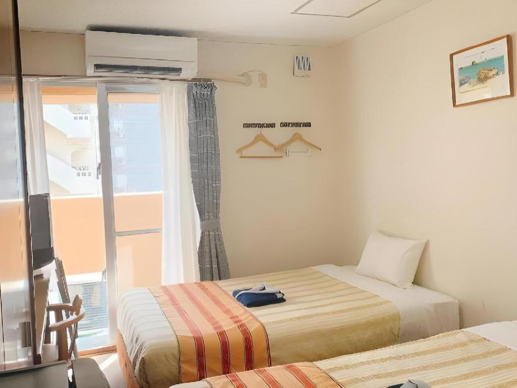 נאהא Hotel Peace Land Kume מראה חיצוני תמונה