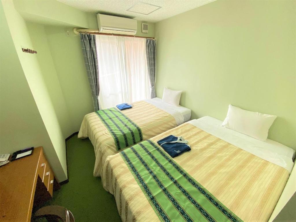 נאהא Hotel Peace Land Kume מראה חיצוני תמונה